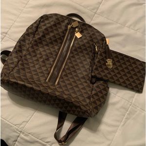 Back pack with wristlet